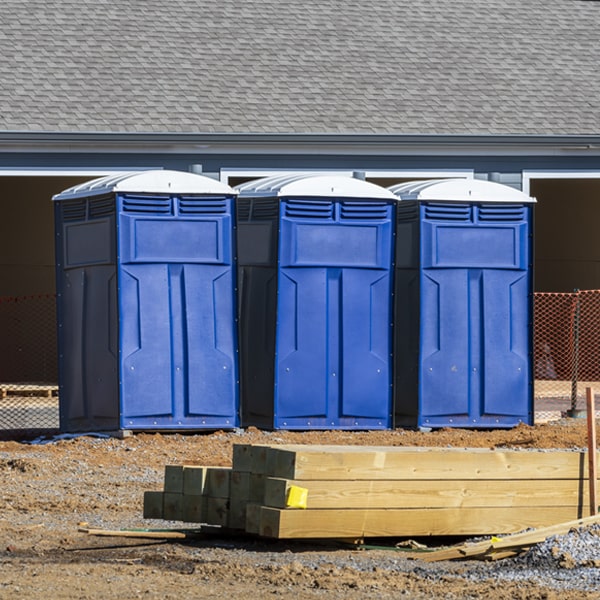 what is the cost difference between standard and deluxe portable toilet rentals in Forest